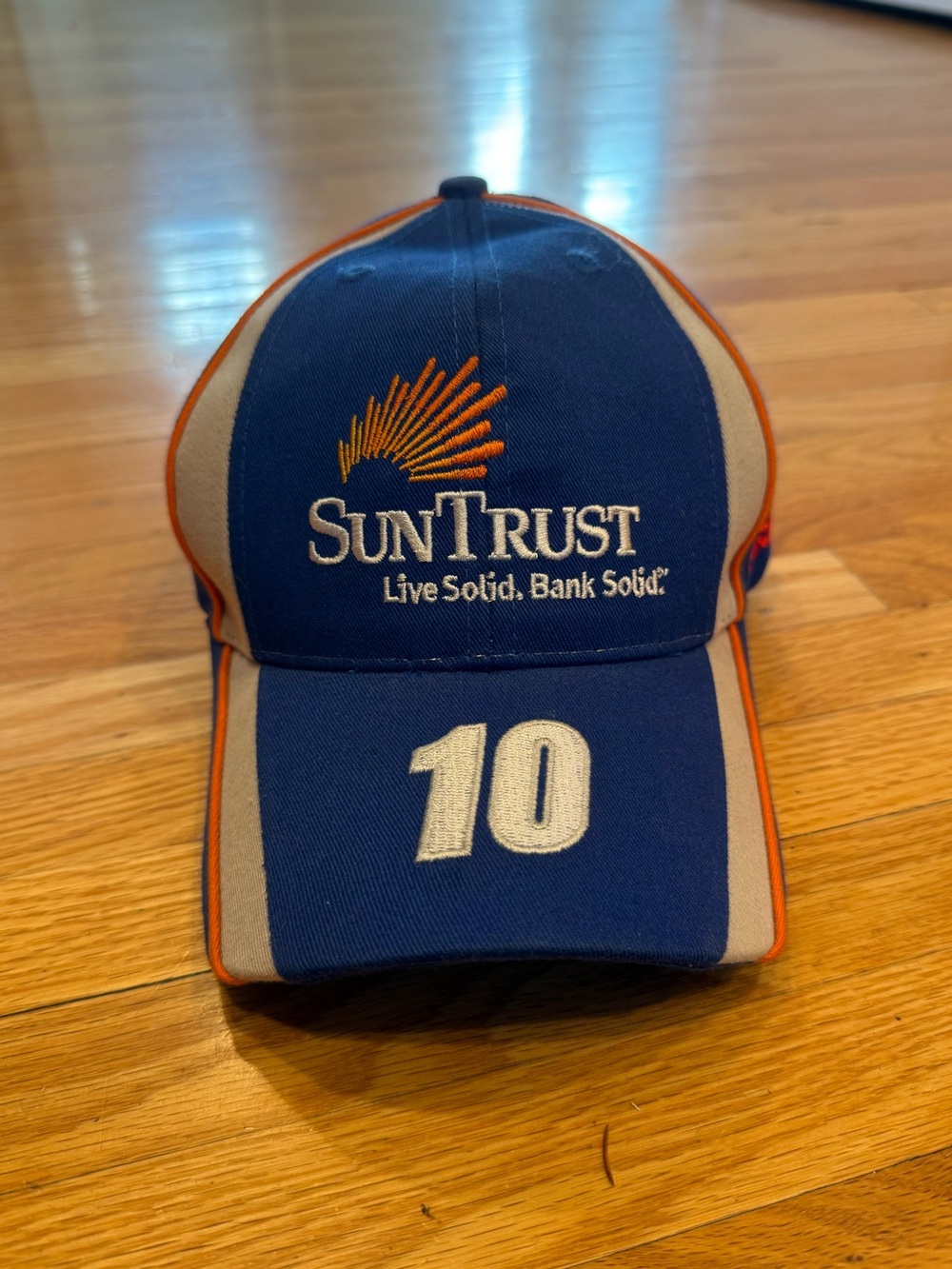 Sun Trust Live Solid Bank Solid Blue and Gray Baseball Cap with Orange Trim